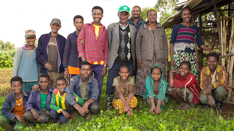 Using data from EthioSIS, Fikadu Garomessa learned which crops and fertilizers are best suited to the soil in his area.  His yields and profits are up, and with the increase in income, he can now send his children to school. Photo: Dasan Bobo