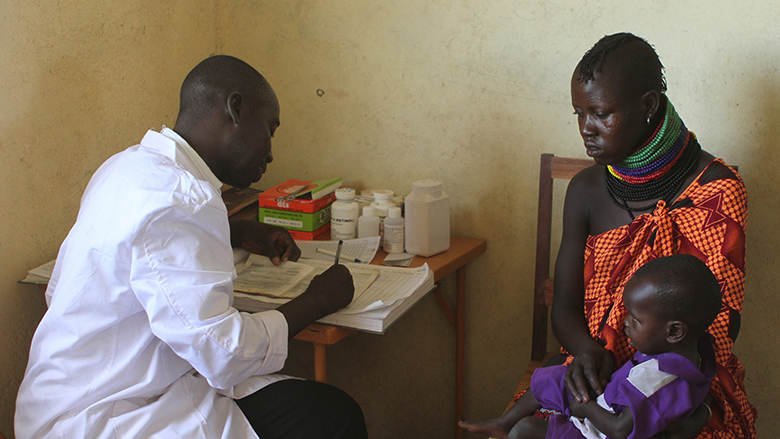 A mother and child getting nutritional advice at a health clinic in Turkana supported by UK aid.