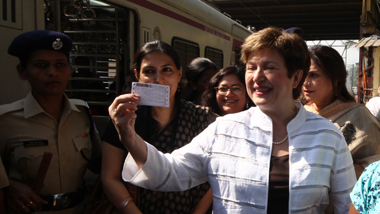 World Bank CEO Kristalina Georgieva holds a suburban train ticket before boarding the ladies compartment at Churchgate station. © World Bank