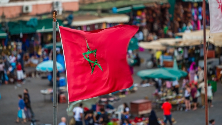Moroccan flag over Djemaa El Fna - Copyright: Shanti Hesse | Shutterstock.com