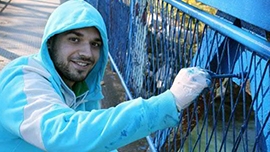 Youth painting bridge, Bosnia & Herzegovina