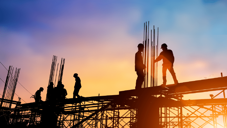 Workers' silhouette on a construction site