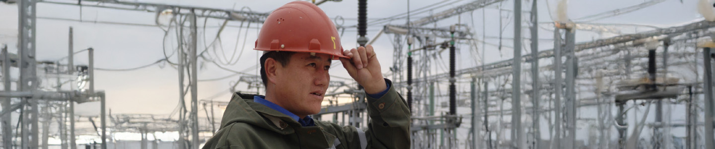 Power plant worker wearing helmet