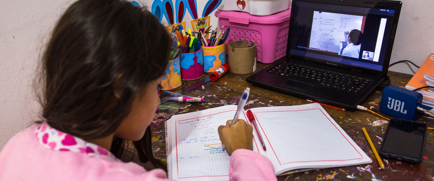 The COVID-19 pandemic has exacerbated the learning crisis, and the impact on the human capital of this generation of learners is likely to be long-lasting. Photo: Michell Huamán taking notes while attending a virtual class due to the pandemic in Lima, Peru. © Victor Idrogo/World Bank