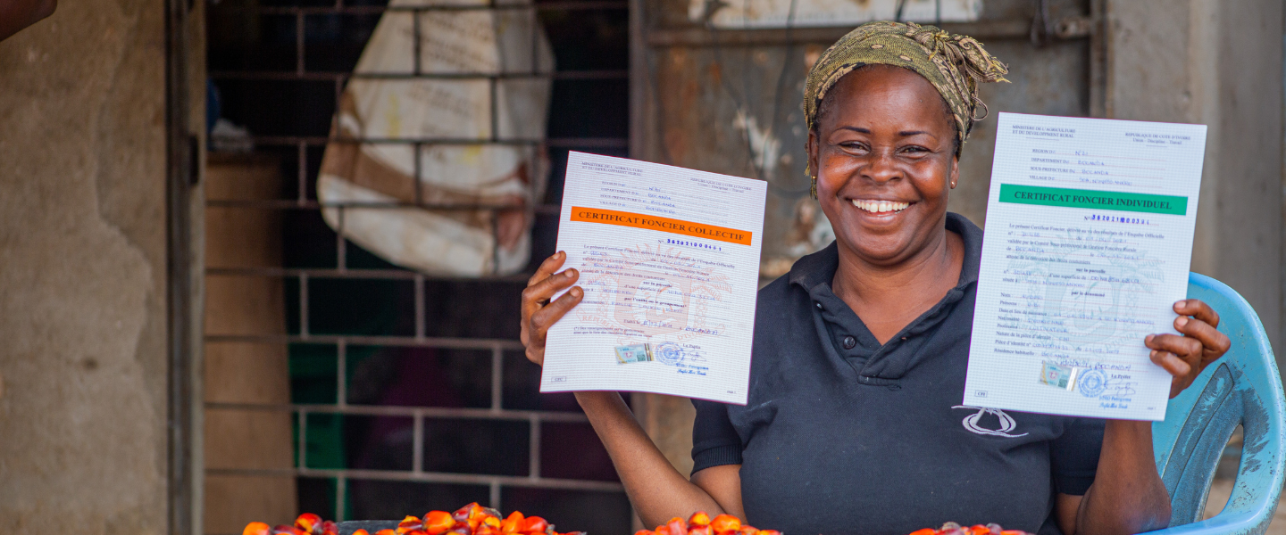 Woman with land tenure certificate in Cote D'Ivoire