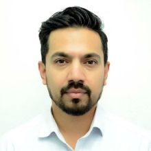 Male wearing white blouse with mustache and a goatee