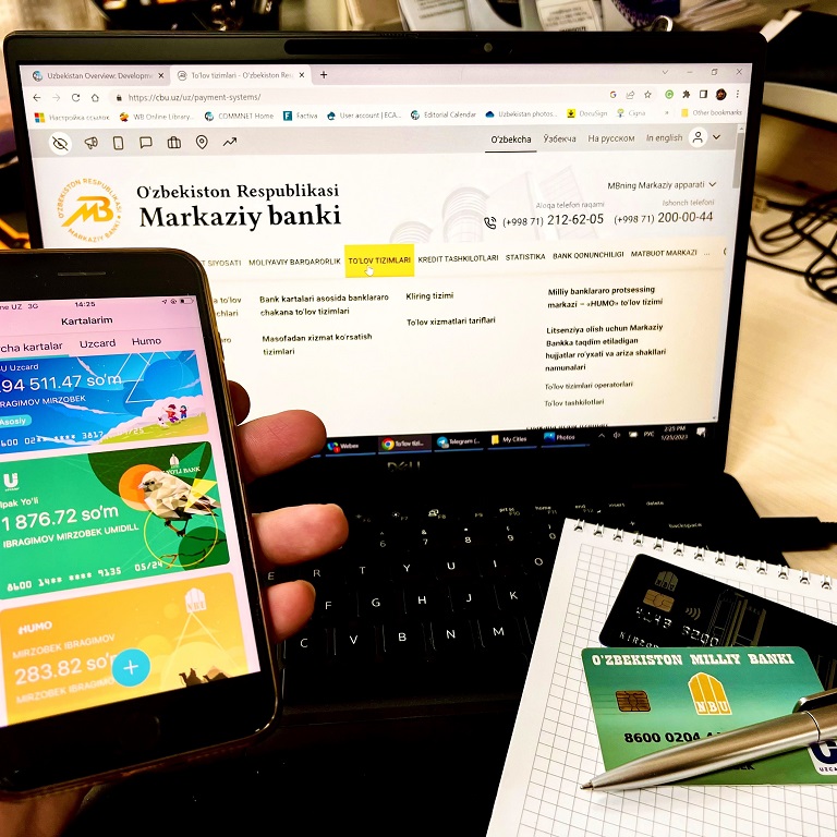 digital banking, hand on phone, pen, credit card