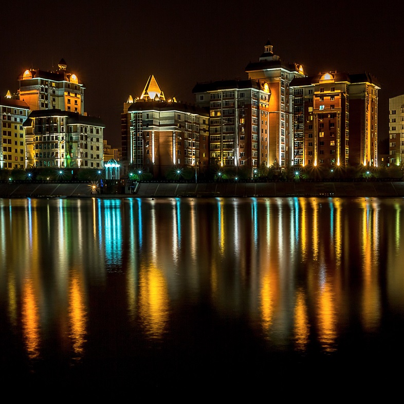 Kazakhstan capital city Astana illuminated at night.