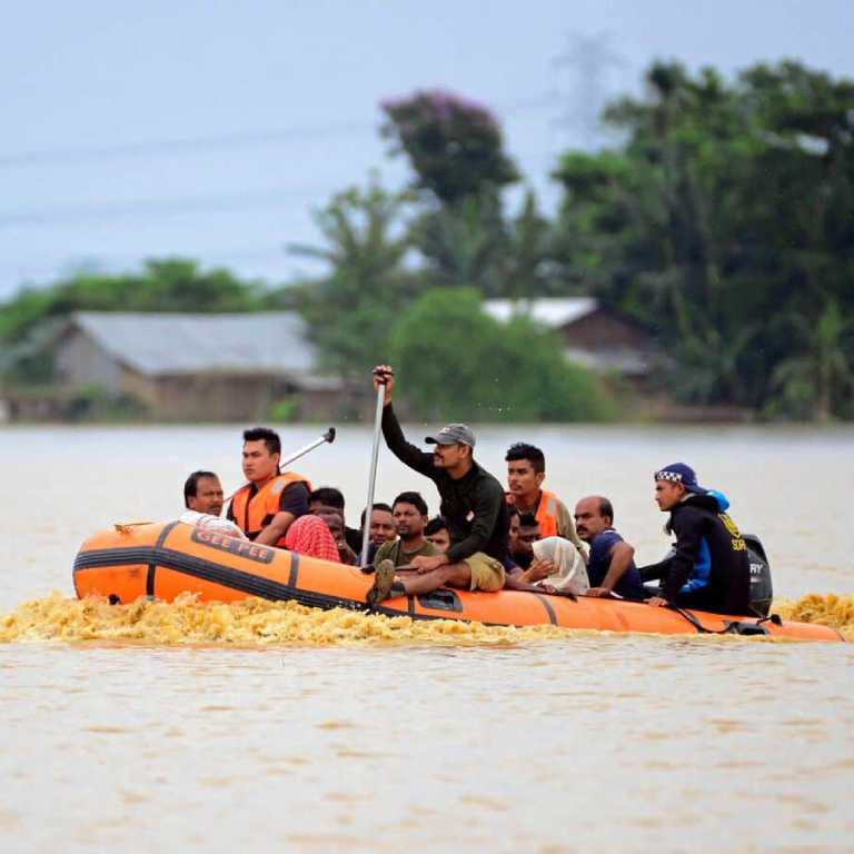 A rescue boat transports victims of flooding in Assam, India, in 2022. Photo: Wiki Commons
