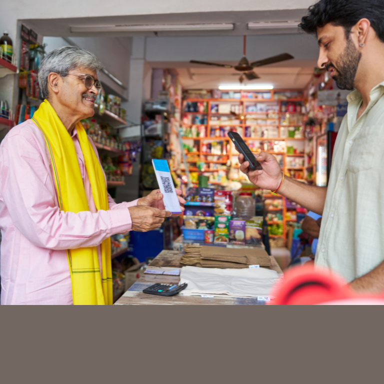 Customer making digital payment at local grocery store
