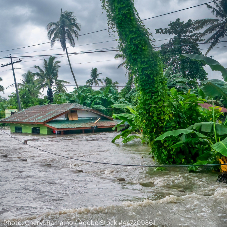 Rising water levels submerging a house as heavy monsoon rains cause major floods in Baco, Oriental Mindoro, Philippines