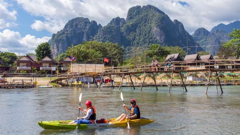 tourist on boats in Lao PDR