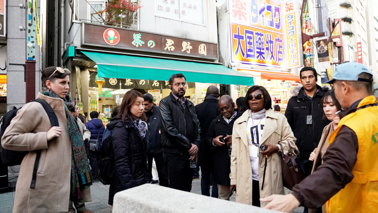 The participants of TDD on low-income urban settlements visiting Ameyoko district in Tokyo during site visit