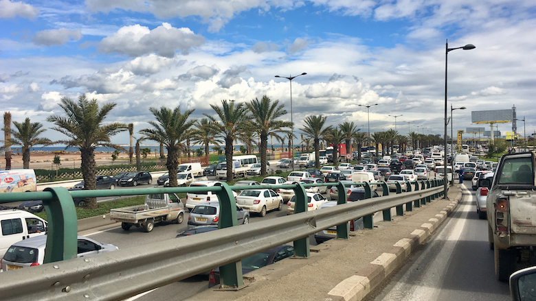 Cars crowd the roads in Algeria.