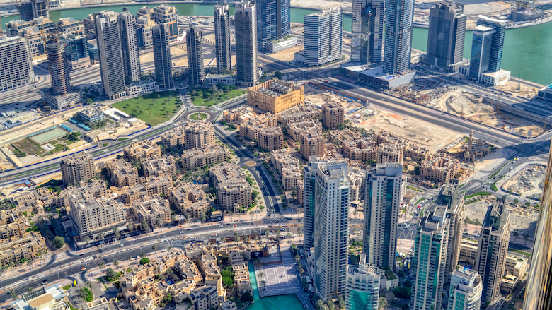Urbanistic view of Dubai from the top of the Burj Khalifa skyscraper in the United Arab Emirates.