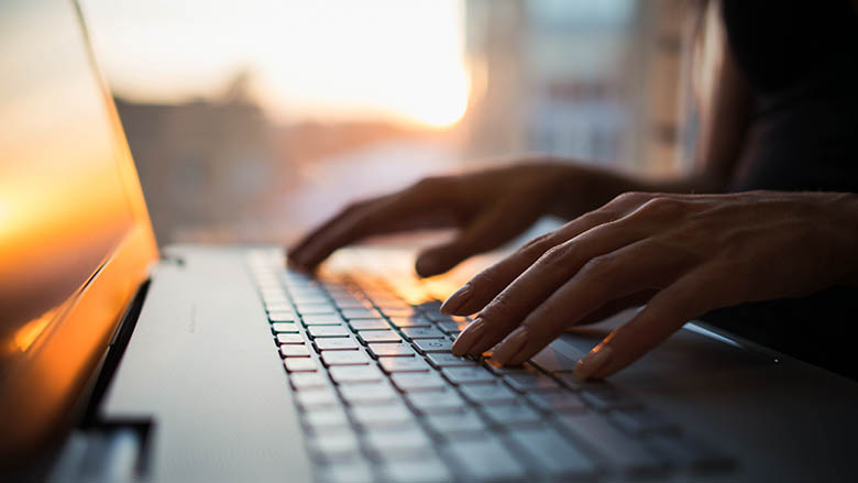 Woman working at home office. Photo: © Undrey/Shutterstock