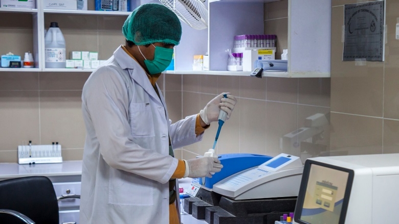 A Laboratory technician at a hospital. Photo: © Tariq siddiq Kohistani/Shutterstock