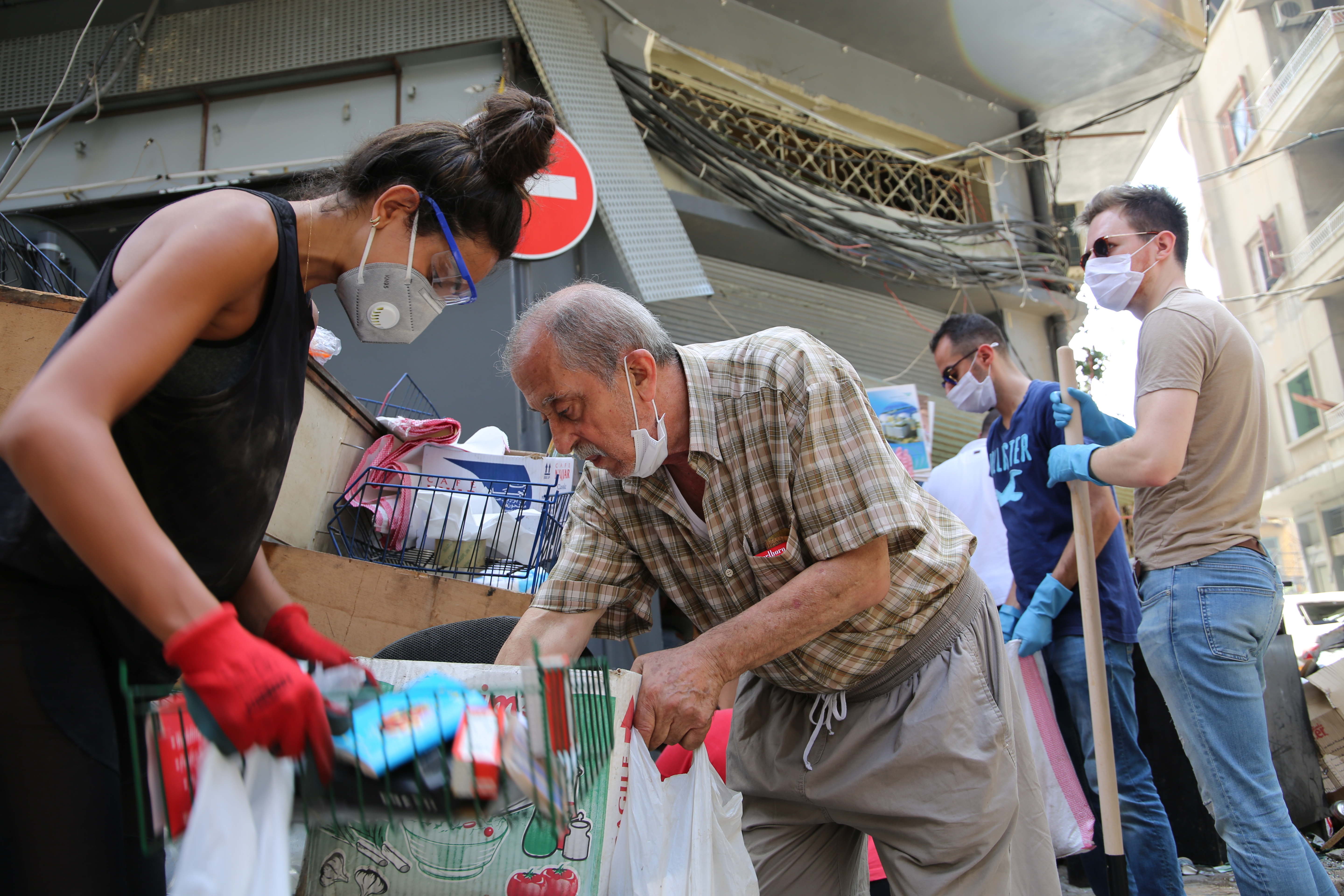 Lebanese volunteers band together to clean up and give aid in Beirut Downtown after the tragic explosion in the Port of Beirut on August 4, 2020.
