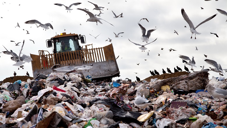 truck on a landfill waste site