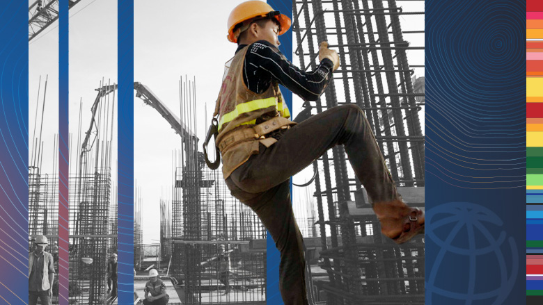 Construction workers carefully lay rebar in preparation to pour concrete on the upper floors of a green building in Hanoi, Vietnam.