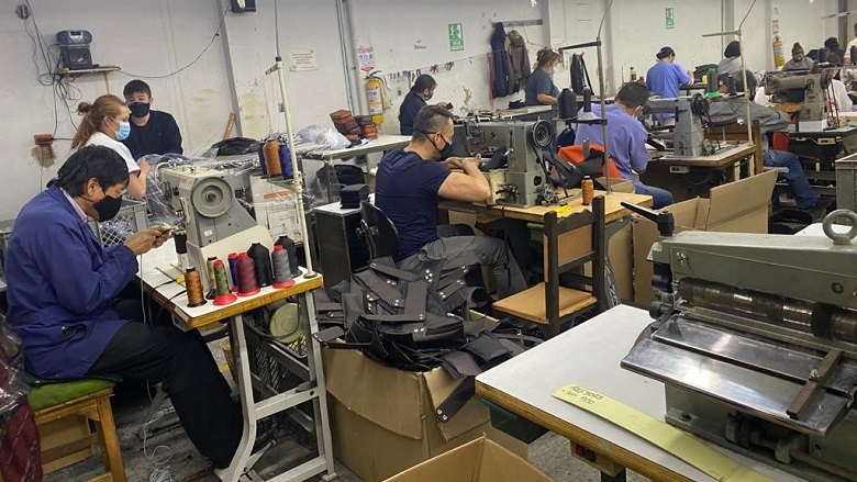 Workers in leather goods factory in Bogota, Colombia