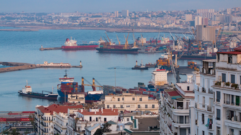 Shipping boats enter the harbor in Algeria.
