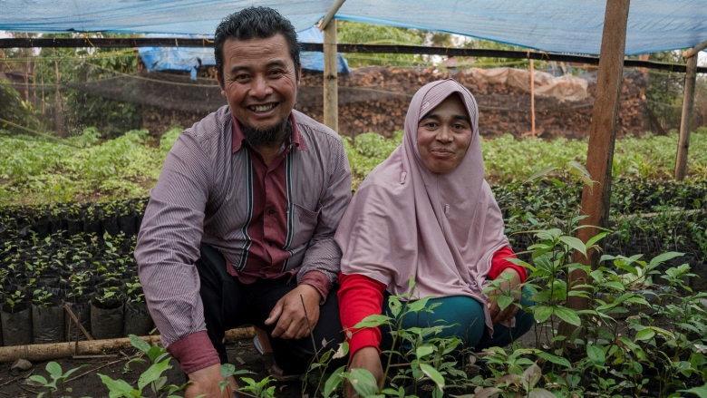 Man and woman at plant nursery in Indonesia