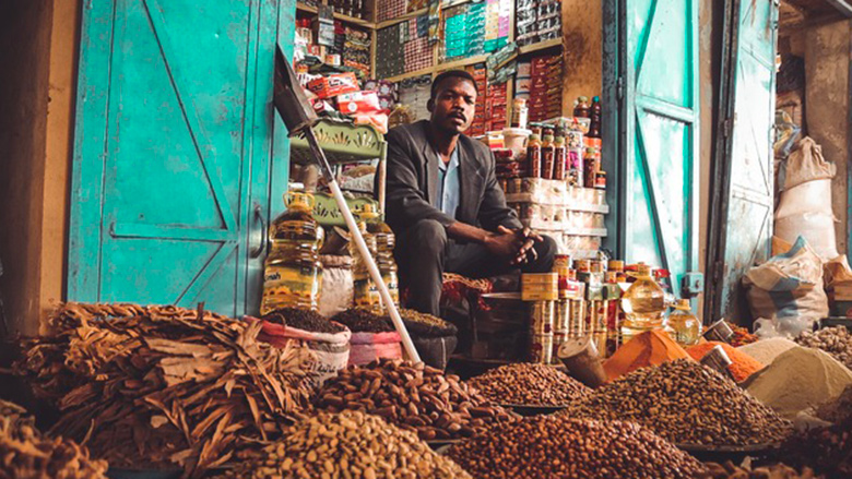 A vendor in his shop