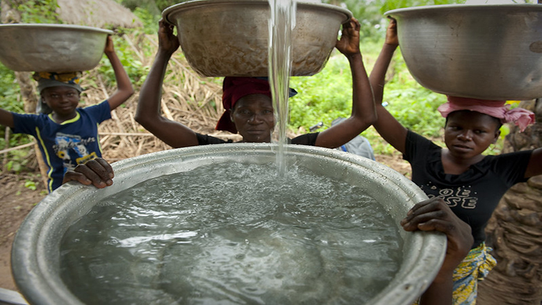 an image of women collecting water