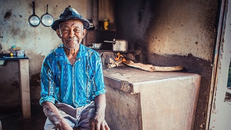 Brazilian man sitting in his kitchen