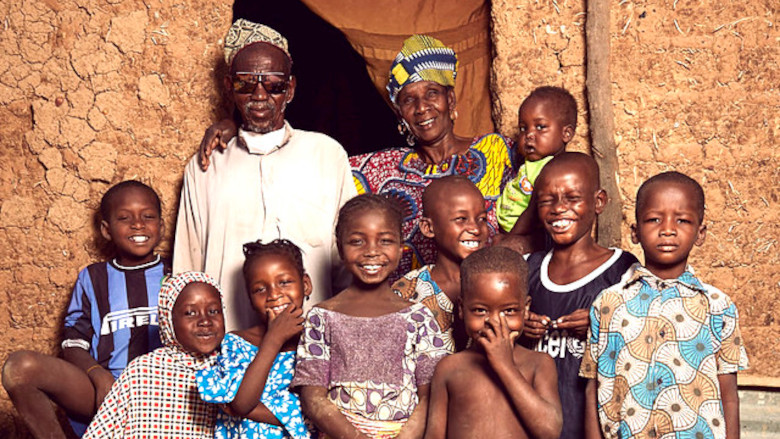 Soumana, his sister Hadjo, and children from Kosseye Satom pose for a picture