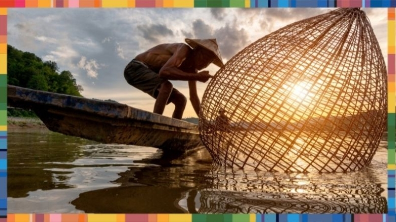 Fisherman fishing in Mekong River in the early morning