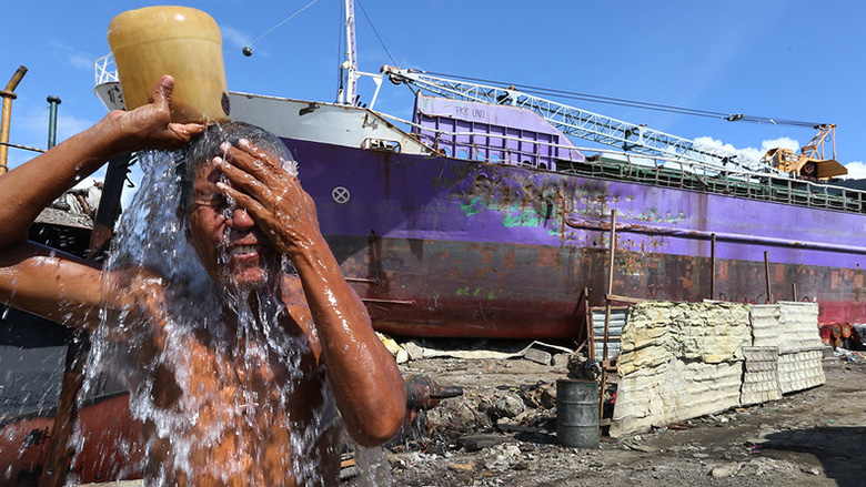 Martin Delingon's bathes near his house on July 13, 2014