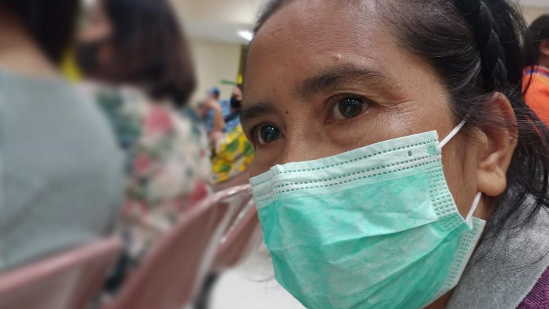  Woman waiting to get COVID19 vaccine. Photo: Shutterstock