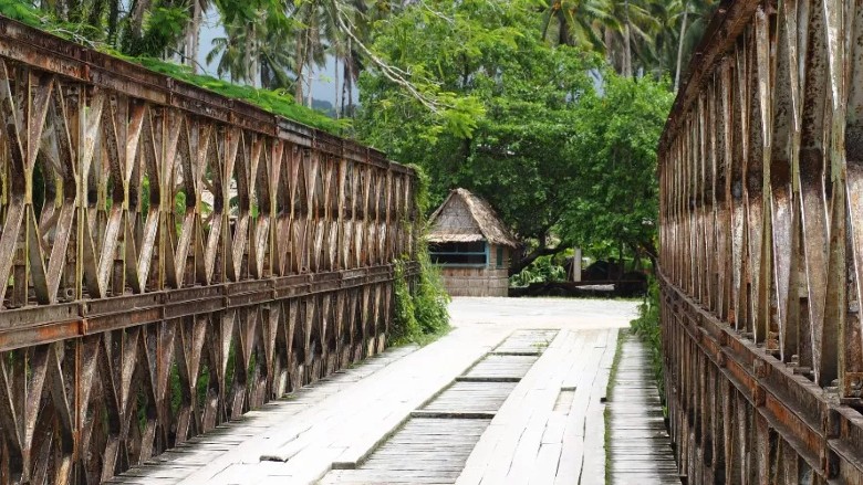 A modular bridge leads to a house in Solomon Islands to offer an opportunity to increase climate resilience