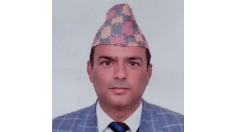 Male wearing Nepalese hat and suit 