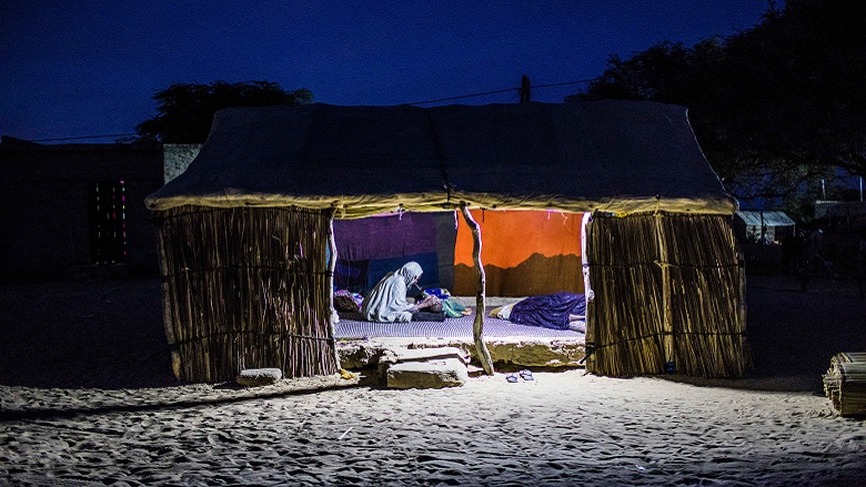 A woman puts to bed her baby at home in Saint Louis, Senegal.