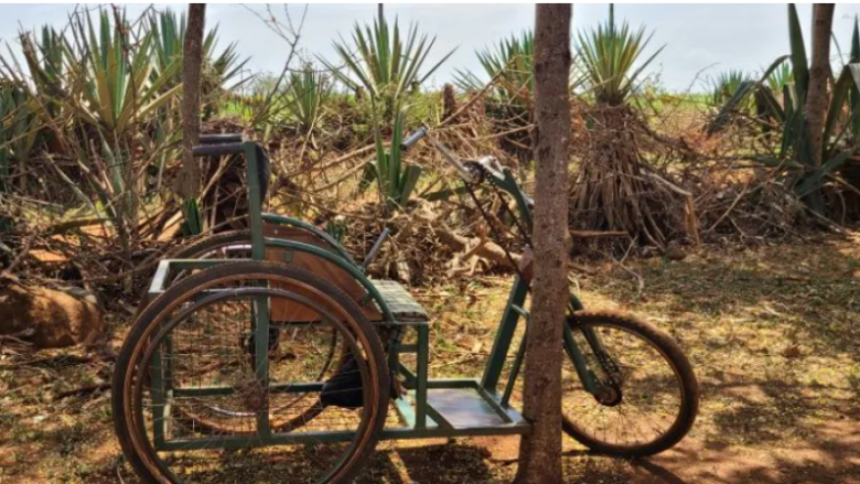 A customized wheelchair with bicycle-like wheels designed for easier navigation on rough terrain in Rural Tanzania. 