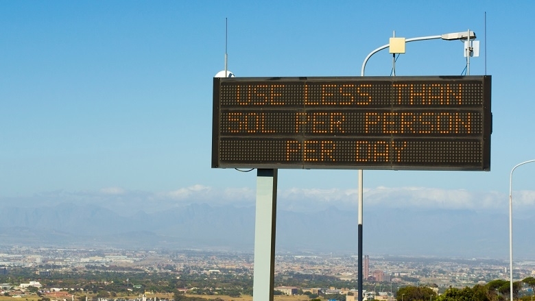 Cape Town water shortage crisis sign saying 'Use less than 50L per person per day'