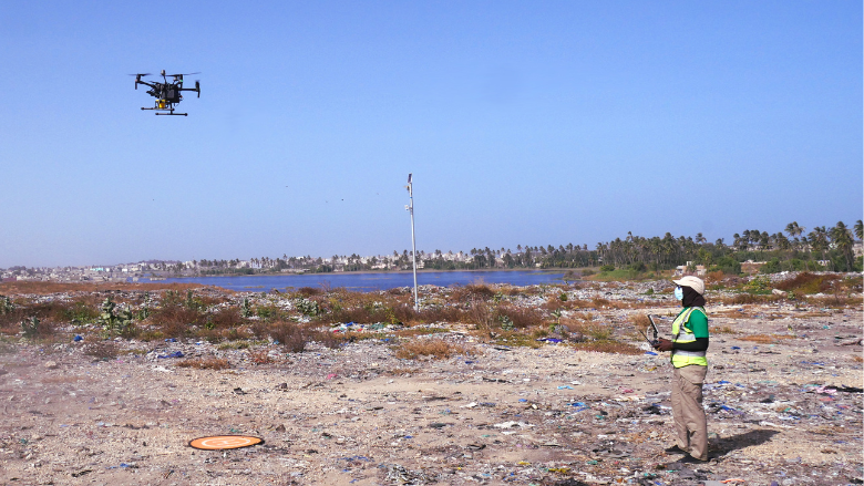 A technician uses a drone to measure methane emissions from a landfill in Senegal. Image by Leonardo Viotti.