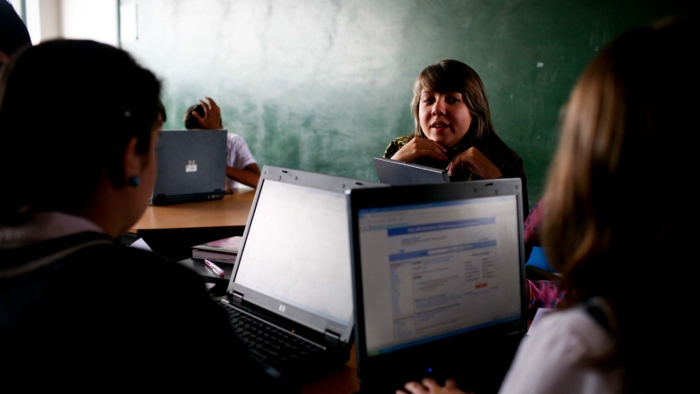 Students around computers