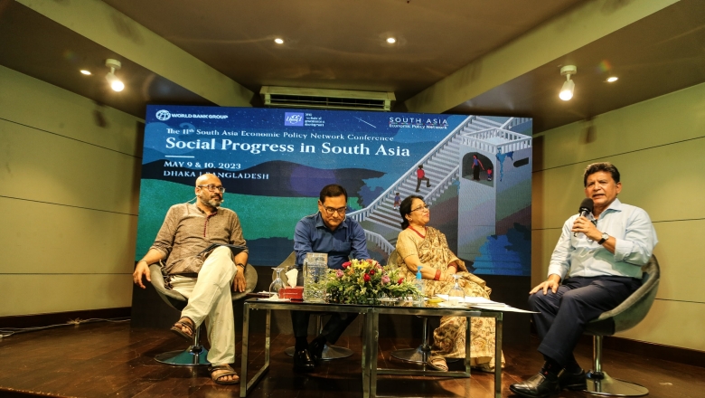 Four speakers on stage