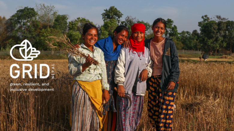 Group of young women in Terai smiling with GRID logo