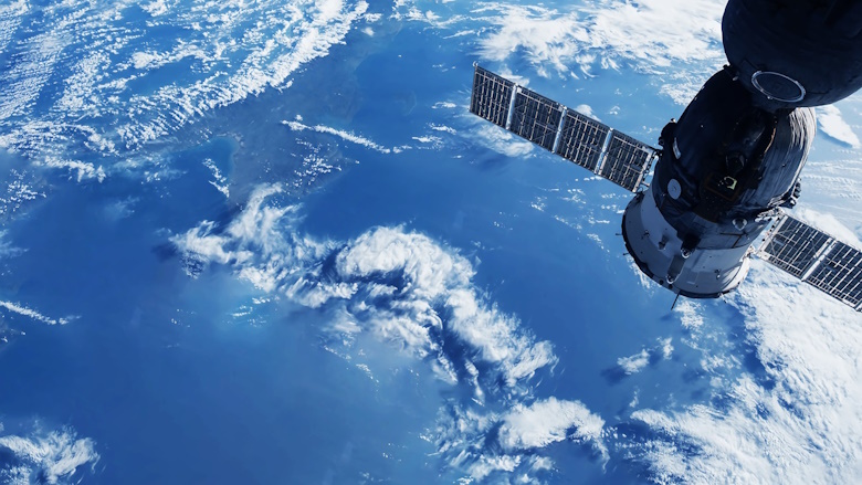 Stock photo of a satellite above the earth