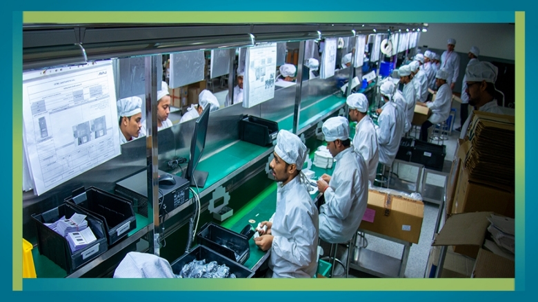 Group of technician and engineer working in mobile manufacturing factory