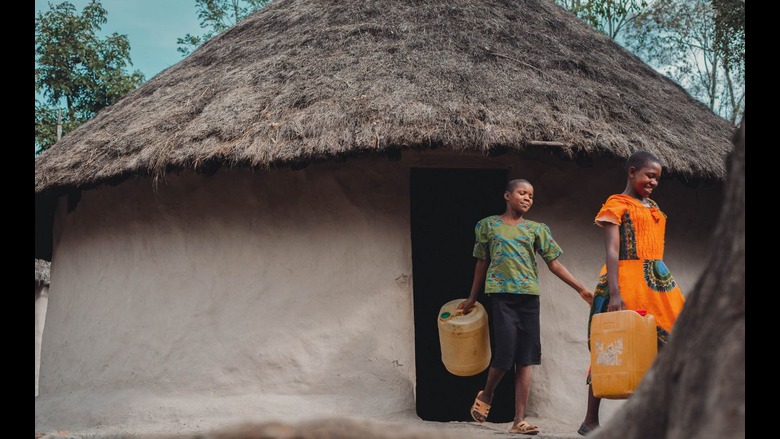 Sisters going to fetch water