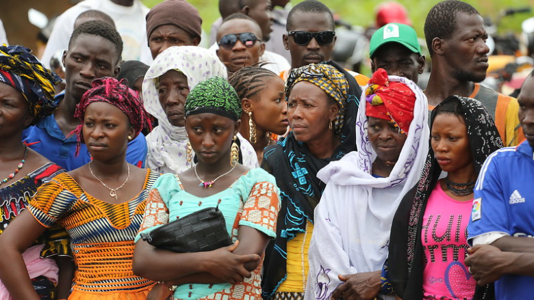 families wait for food in guinea