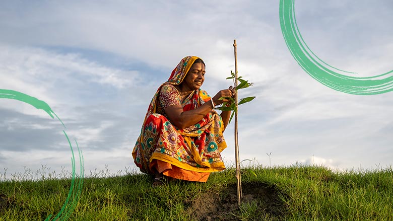 Woman holding a plant