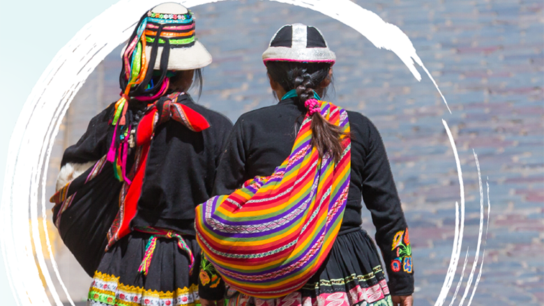 Two indigenous women walking